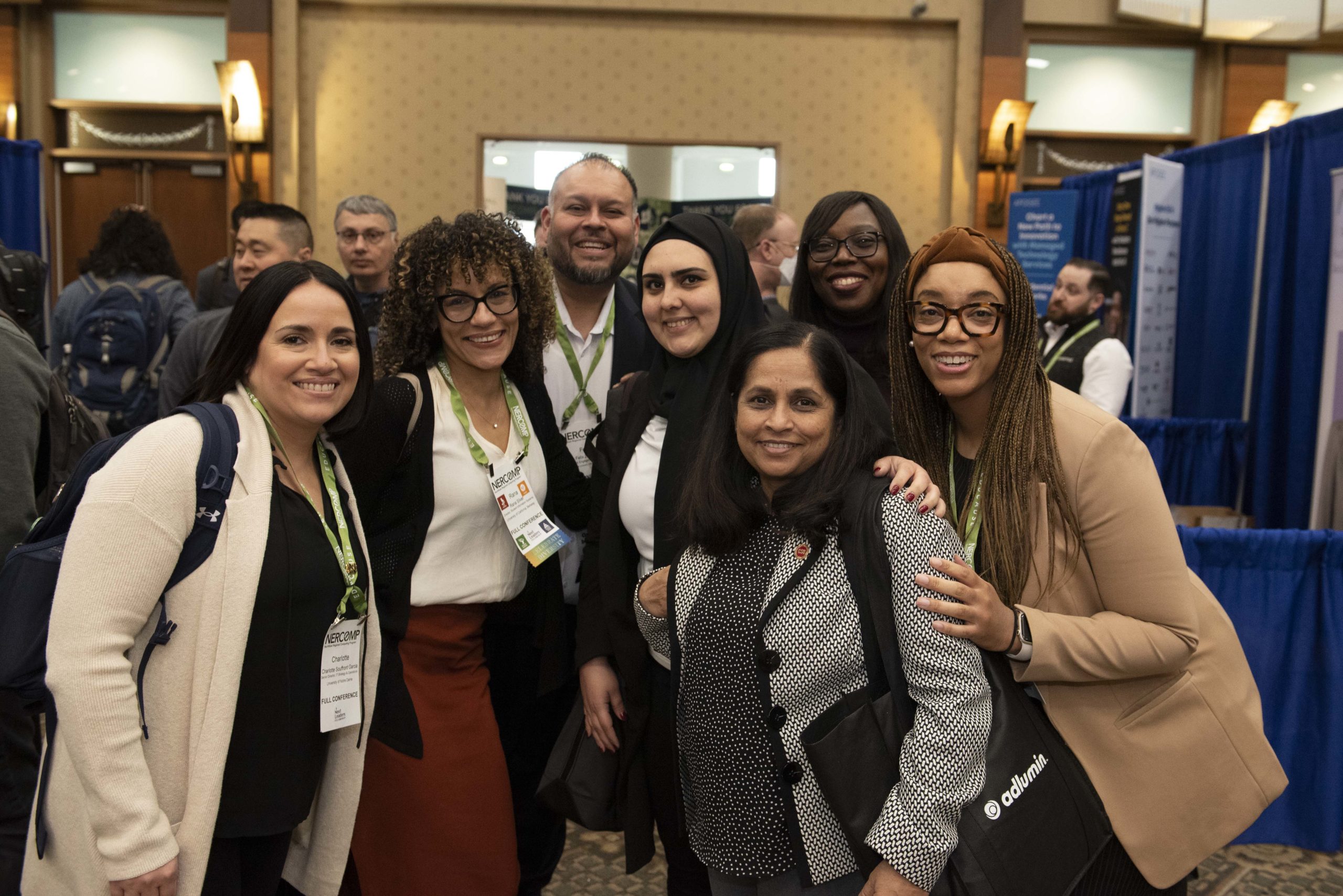 group of people in the exhibit hall